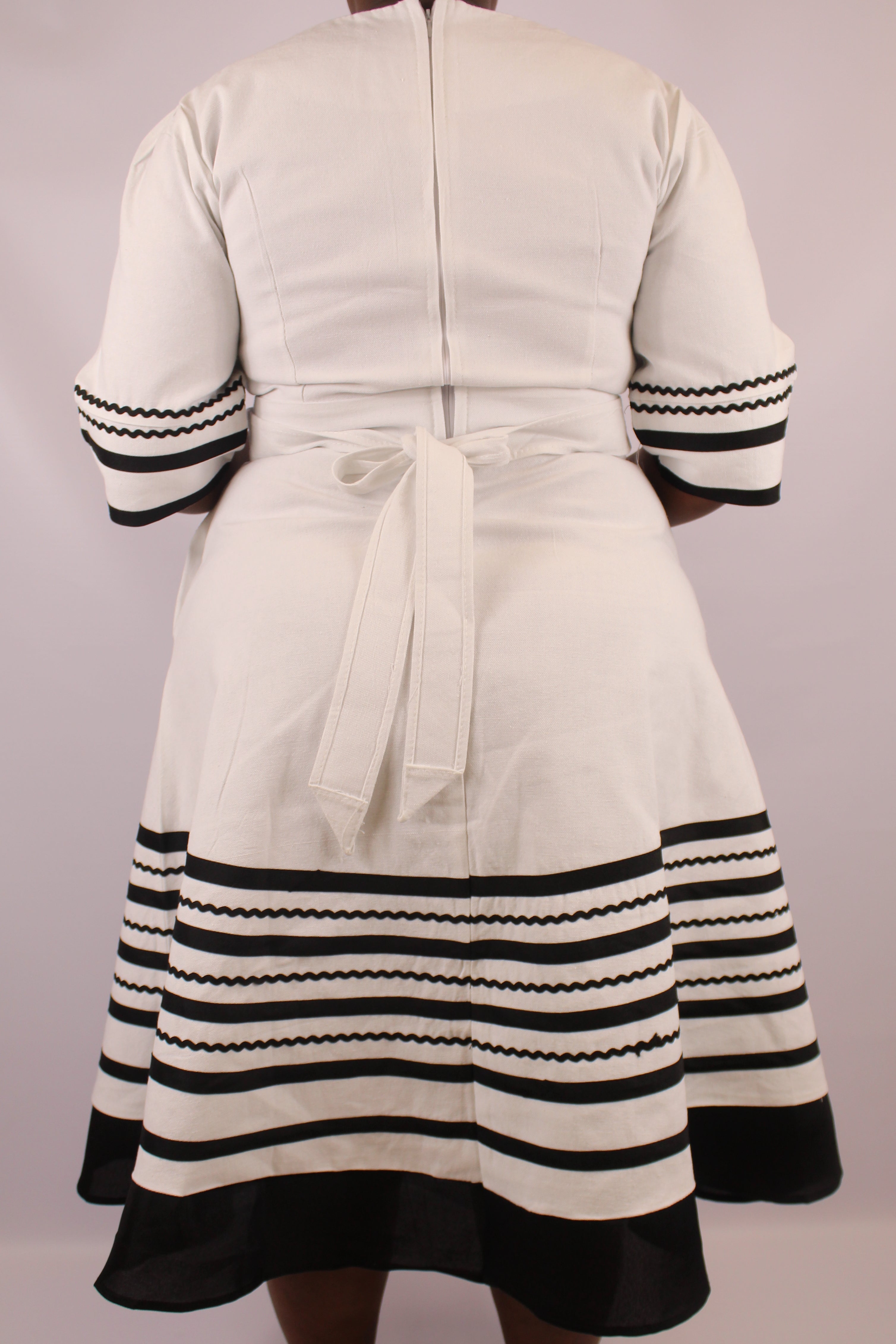 Black and white sales xhosa traditional dresses